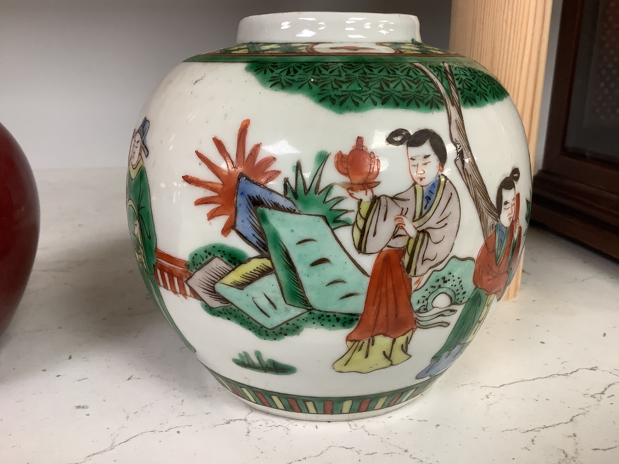 A Chinese famille verte jar and a sang de boeuf vase